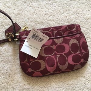SOLD Coach red gold wristlet